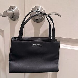 Cute nylon Kate Spade black evening clutch.